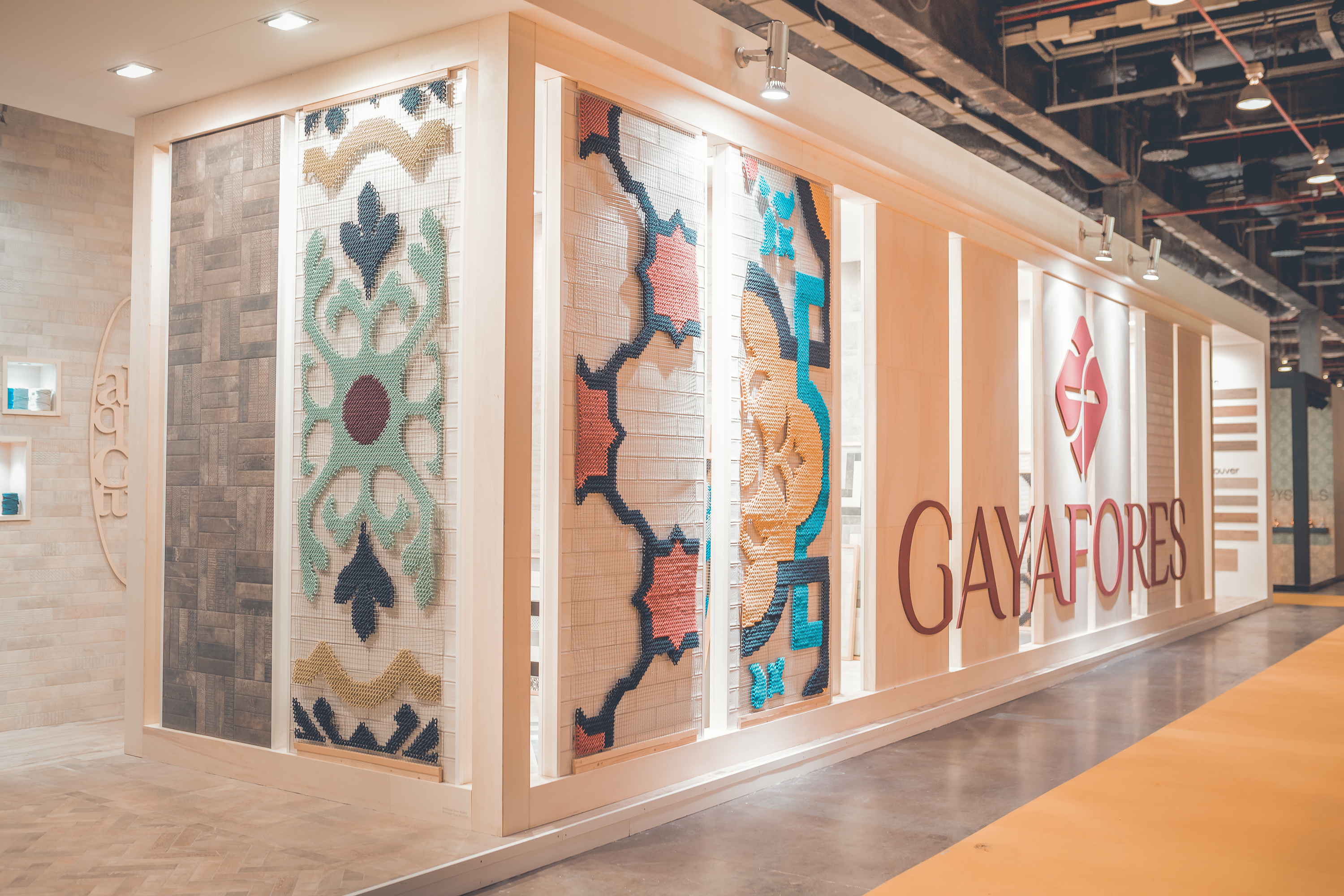 Gayafores — embroidered tile pattern panels exhibition stand