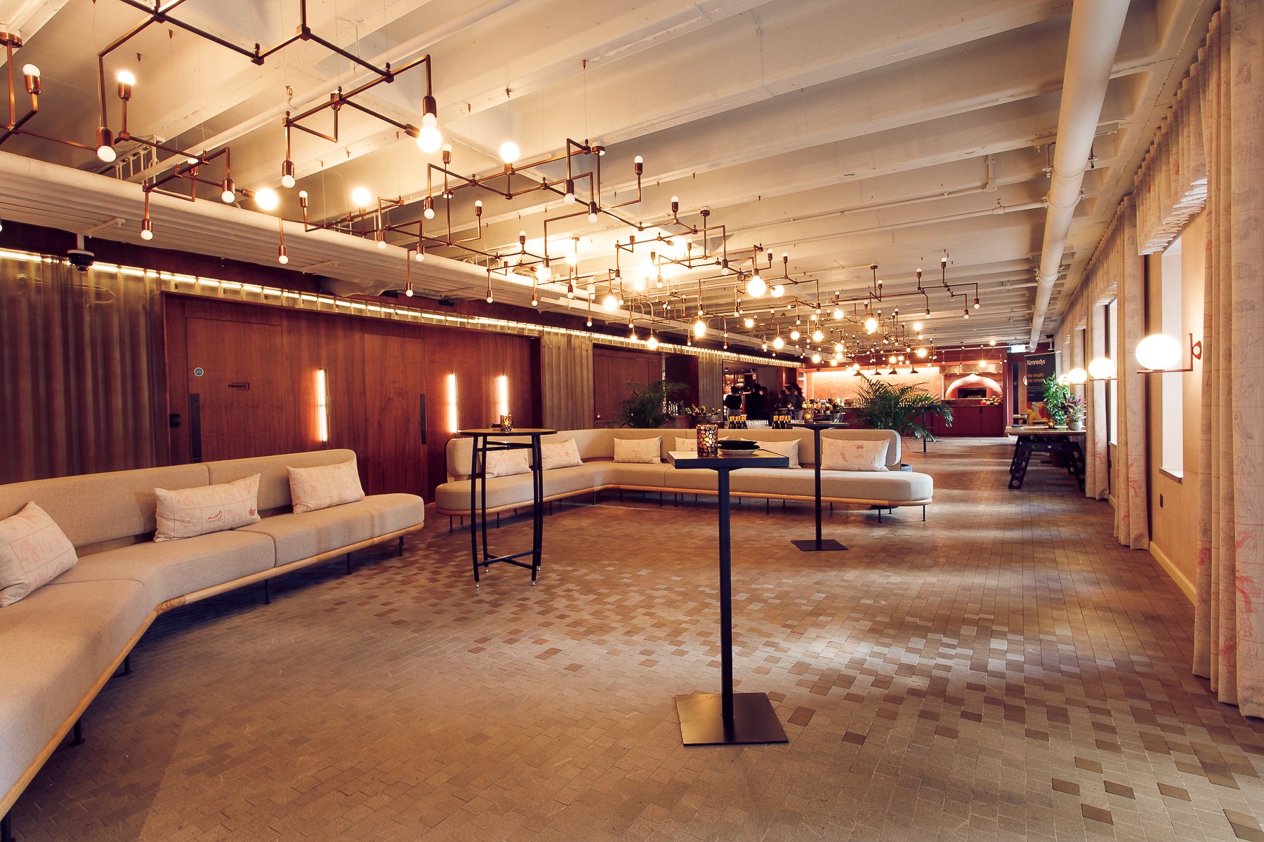 Penny Squares — embroidered curved sofa Canopy by Hilton London City