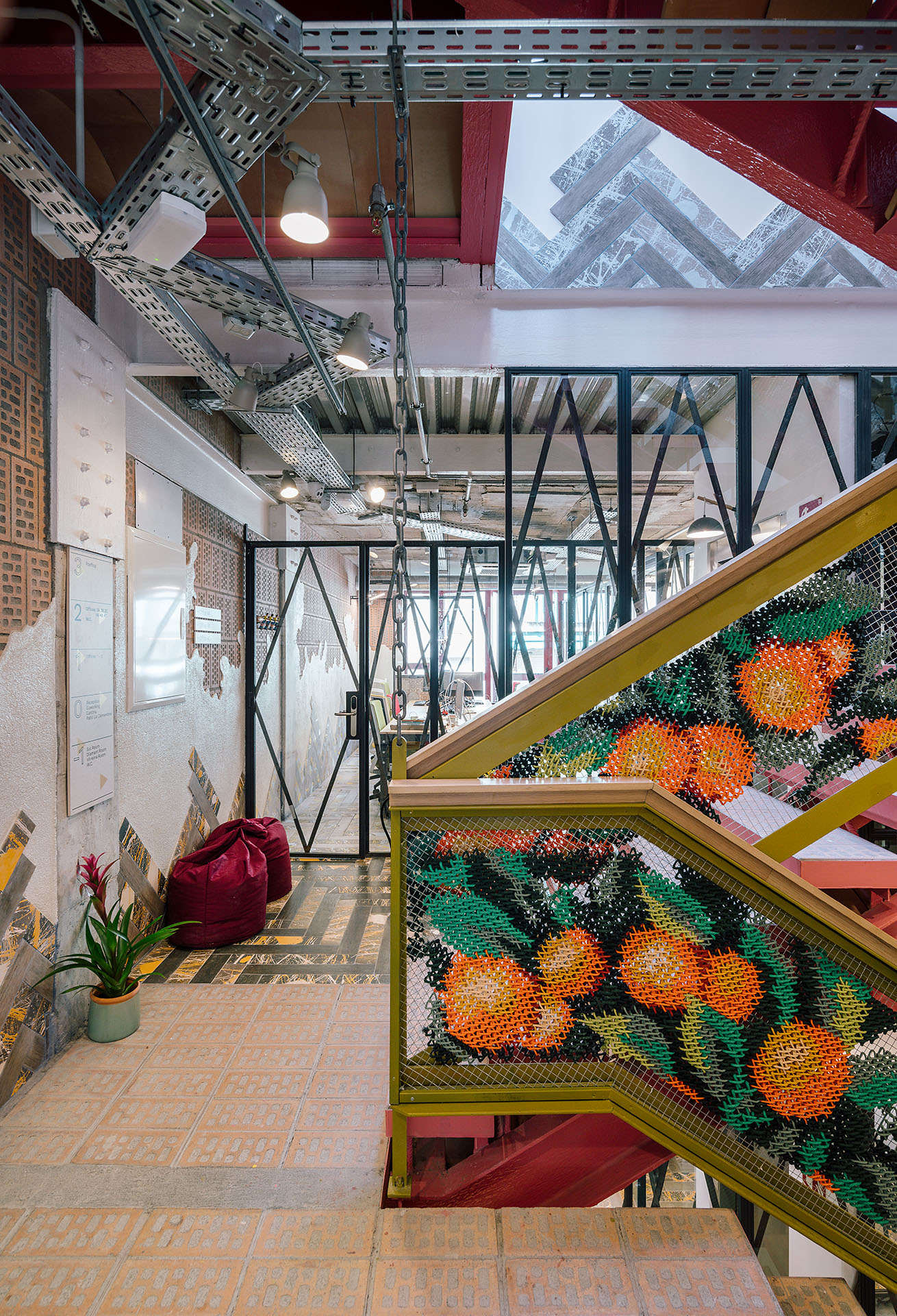 UtopicUs Clementina — close view of embroidered clementines on staircase railing