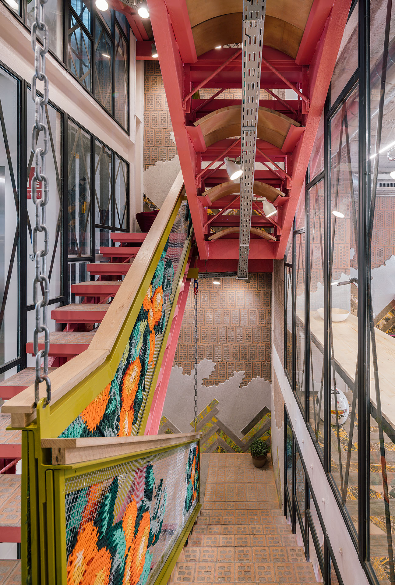 UtopicUs Clementina — full staircase view showing embroidered railings across all floors